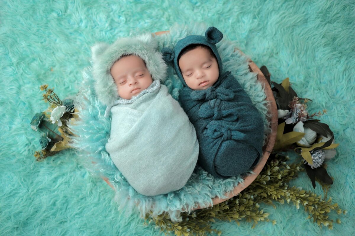 Photo by krishna Kids Photography: https://www.pexels.com/photo/adorable-twin-babies-in-cozy-swaddles-32327827/