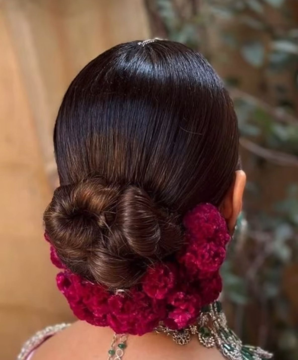 Twisted Knot Bun With Ruby Red Roses for bride